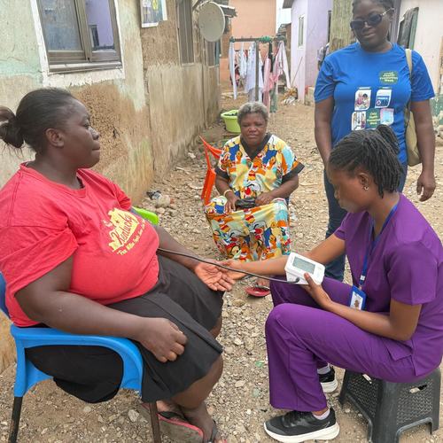 Public health internship student Beatrice from Williams college USA during a community outreach in La Accra with the La Public Health Directorate CHPS Compound nurses